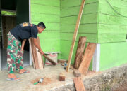 Rumah RTLH Bapak Robert S. Selesai Direhab, Satgas Karya Bakti TNI AD Lakukan Pembersihan Lingkungan